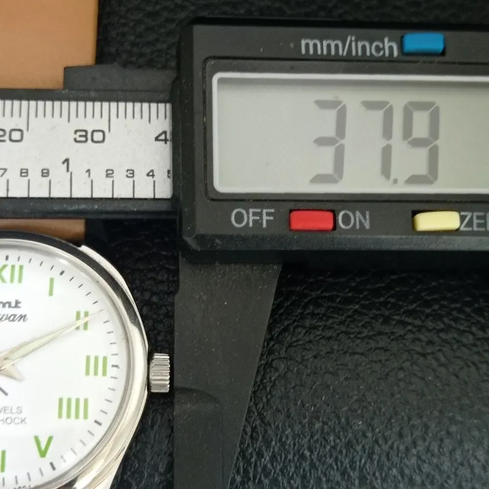 Vintage 1974 HMT Manual Wound Mens Silver Watch & Green accents